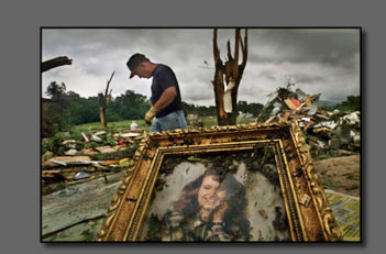 Photo of framed picture found after severe storm hits.